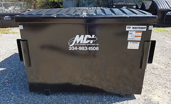 4 cubic yard MDI front load dumpster on site