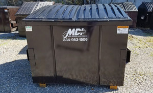 6 cubic yard MDI front load dumpster on site