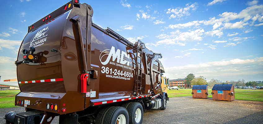New MDI front load garbage and recycling truck preparing for pickup
