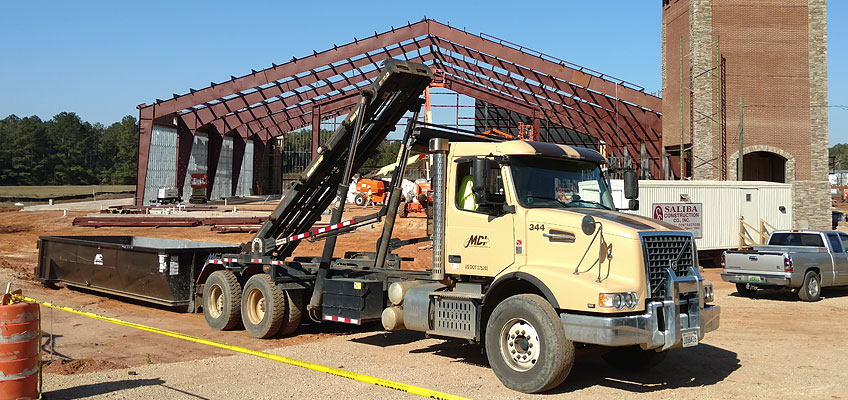 MDI Roll-off Truck and container drop-off on site